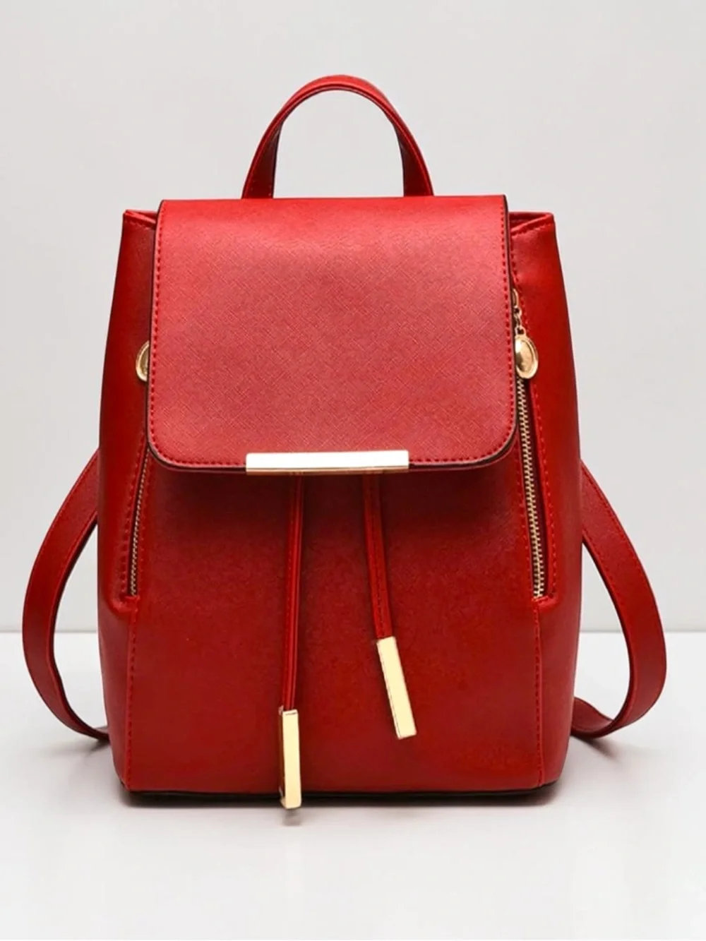 Red faux leather backpack bag